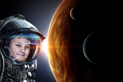 Kid boy astronaut in space over Earth planet. Elements of this image furnished by NASA