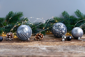 Elegant gray christmas scene on natural wood table background