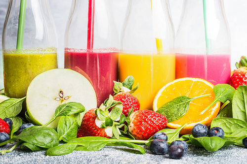 Close up of colorful smoothies with various ingredients.  Superfoods and healthy lifestyle or detox  diet food concept.
