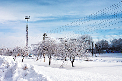 Railway station in winter. Snow-covered urban scene in Belarus