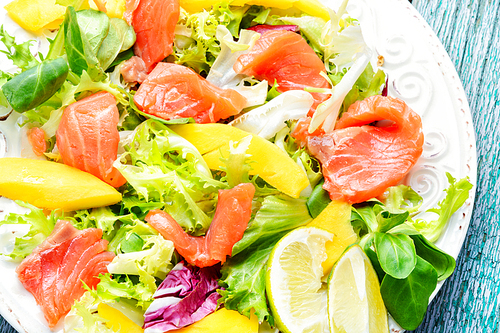 Salad with salmon,mango and fresh lettuce