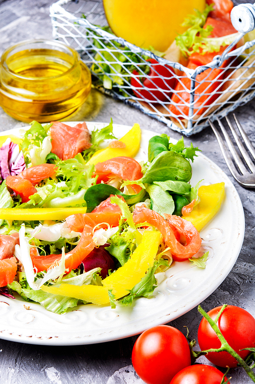 Diet salad with salmon,mango and fresh lettuce