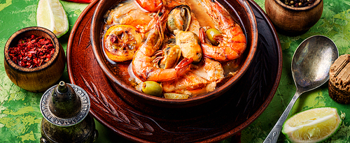 Seafood soup with prawns, mussels and fish.Delicatessen food
