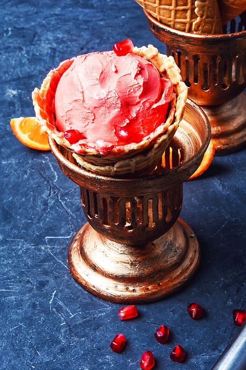 ice cream with pomegranate flavor in stylish cup holder