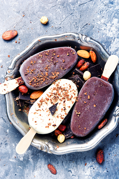 vanilla ice cream with chocolate and nuts