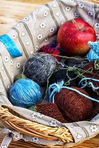 ball of knitting yarn and sewing accessories