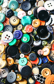 Texture of variety of buttons from clothing.Top view