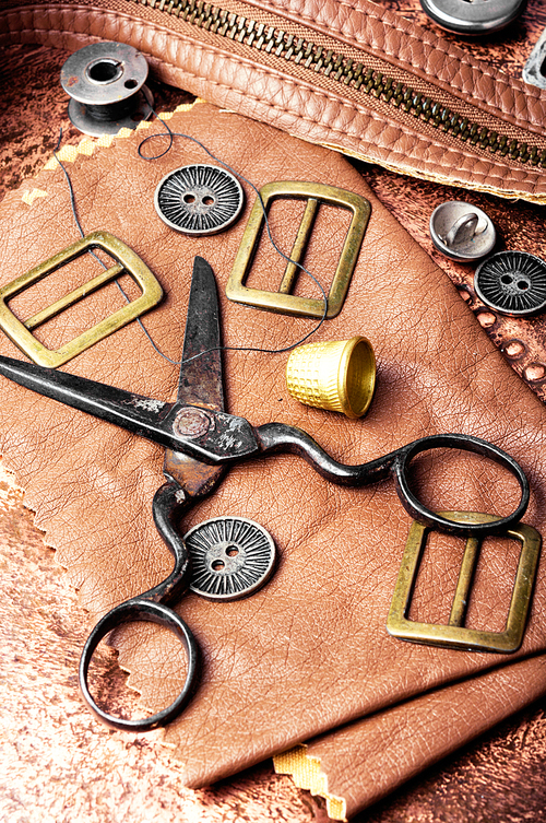 Working tools and cut out pieces of leather