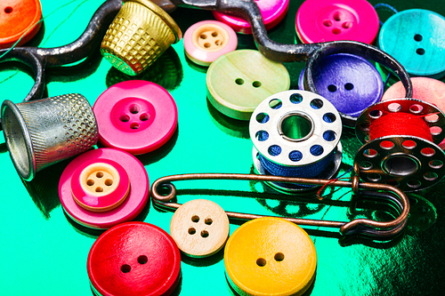 Accessories for tailoring.Bright assorted sewing buttons in mix colors