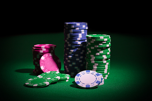 Playing chips on green table