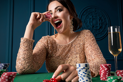 Young woman playing in casino