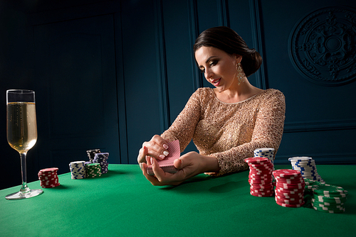 Young woman playing in casino