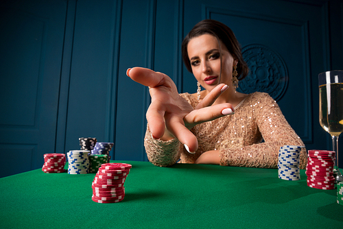 Young woman playing in casino