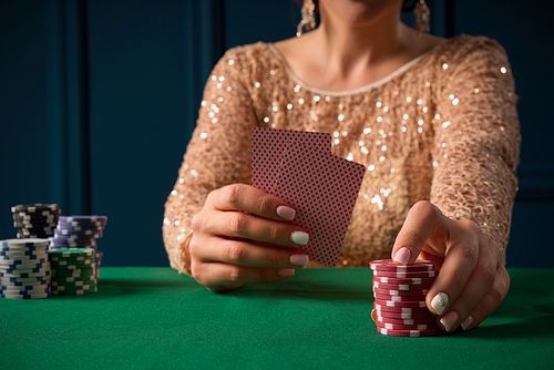 Beautiful woman playing in casino