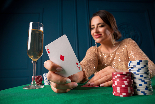 Beautiful woman playing in casino