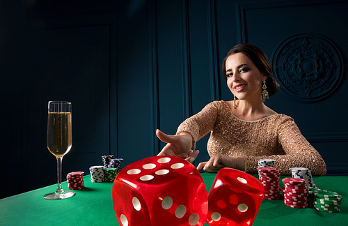 Beautiful woman playing in casino