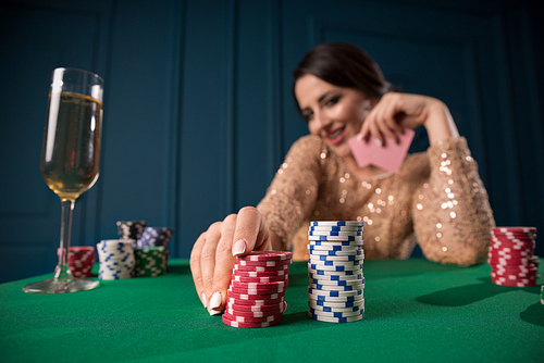 Beautiful woman playing in casino