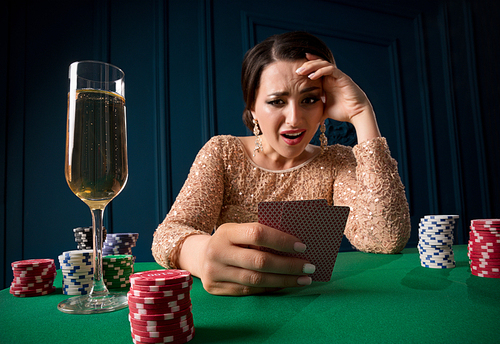 Beautiful woman playing in casino