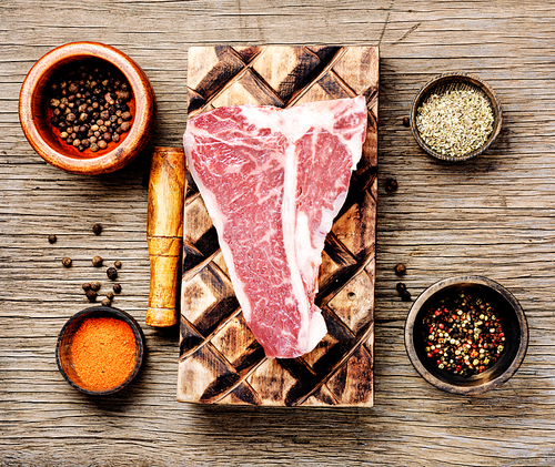 Raw meat, beef steak on cutting board.Ribeye meat steak