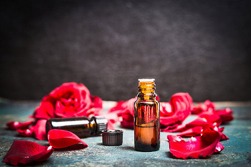 Roses essential oil for cosmetic products, aromatherapy treatment , spa or wellness.
