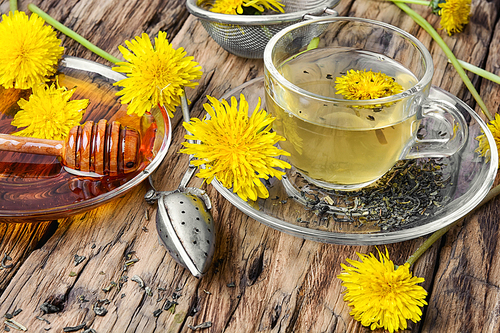 Cup of tea with honey healthy dandelion honey