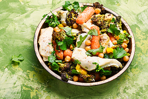 Chicken with vegetables and chickpeas in Indian.Indian kitchen