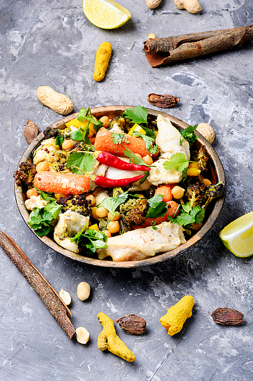 Chicken with vegetables and chickpeas in Indian.Indian food