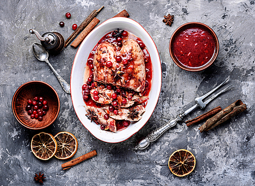 Grilled healthy chicken breasts with cranberry sauce