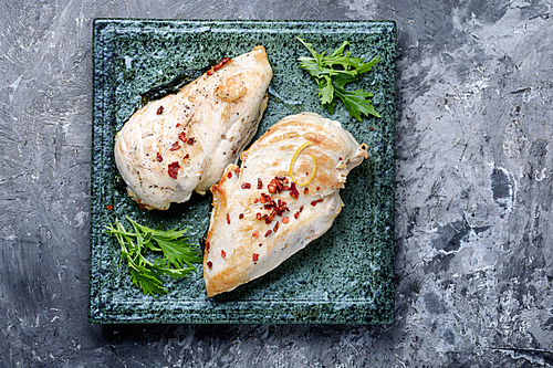 Baked chicken breast stuffed with spinach.Grilled chicken breast