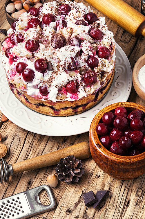 home cream pie with cherry in a rustic style