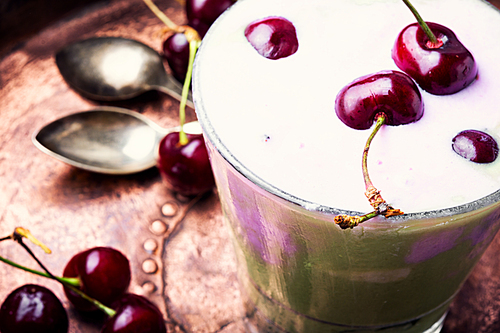 Glass of summer ice cream with cherry flavor