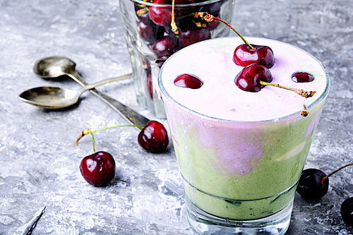 Glass of summer ice cream with cherry flavor