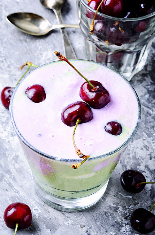 Glass of summer ice cream with cherry flavor