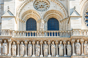 Architectural details on facade of famous cathedral Notre-Dame de Paris. Paris, France