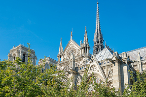 Notre Dame de Paris - famous cathedral with blue sky