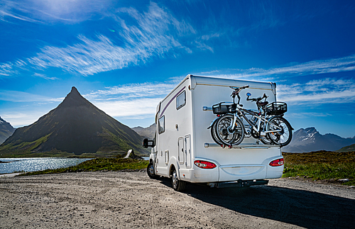 Family vacation travel RV, holiday trip in motorhome, Caravan car Vacation. Beautiful Nature Norway natural landscape.