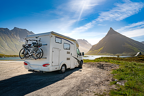 Family vacation travel RV, holiday trip in motorhome, Caravan car Vacation. Beautiful Nature Norway natural landscape.