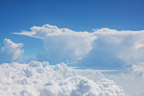 Sunny background, blue sky with white clouds, natural background.