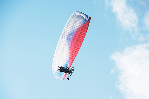 Paragliding in the mountains. Paragliders in fight in the mountains, extreme sport activity.