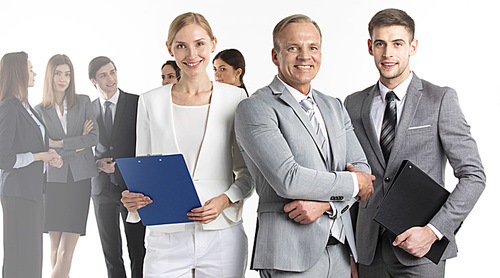 Portrait of business leaders and their team isolated on white