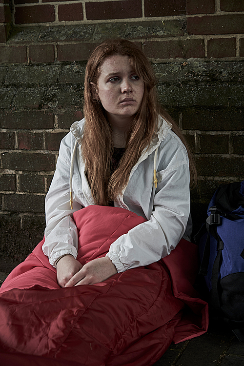 Vulnerable Homeless Teenage Girl Sleeping On The Street