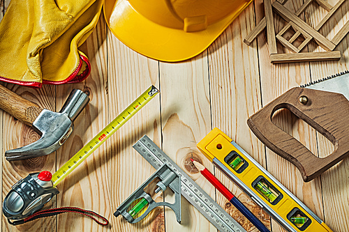 composition of construction tools  on wooden background