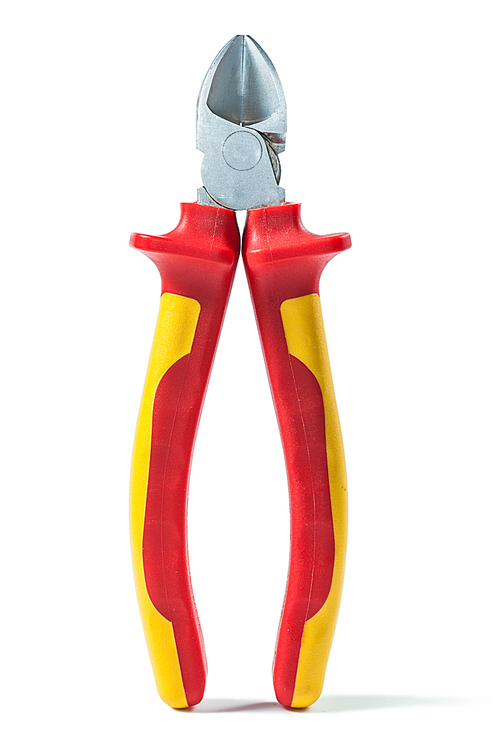 nippers with yellow red handles isolated