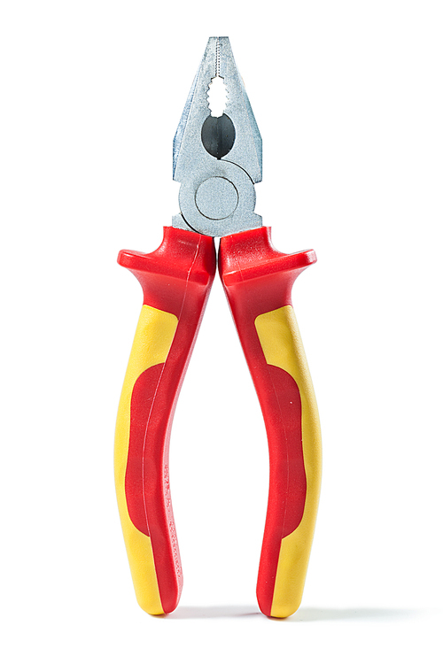 pliers with yellow red handles isolated