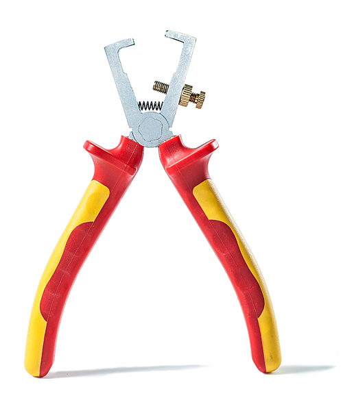 wire stripper with yellow red handles isolated