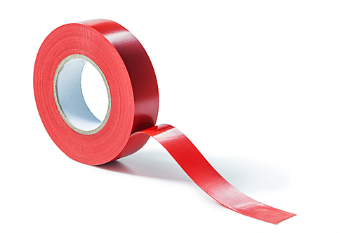 red roll of insulation tape isolated
