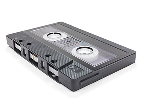 Compact audio cassette tape on a white background