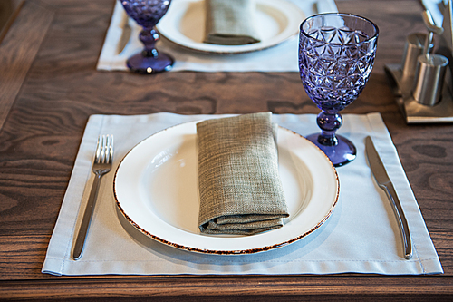 Empty luxury dish on table in restaurant.