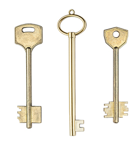 set of three brass house doors keys isolated on white