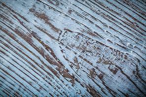Messy vintage wooden surface top view.